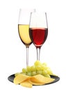 Wineglasses with white and red wine and cheese Royalty Free Stock Photo