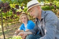 Winemakers father share its experience with son Royalty Free Stock Photo