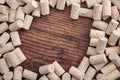 Winemaking cellar, winery backgrounds and selection of fine wines concept with full frame shot of wine bottle corks on wood