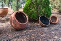 Winemaking earthenware. Ancient, historical clay vessels for wine preparation. Wine making barrels