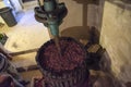 Winemaking. Old wooden wine press with must inside. Pressing of Royalty Free Stock Photo