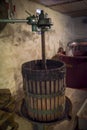 Winemaking. Old wooden wine press with must inside. Pressing of Royalty Free Stock Photo