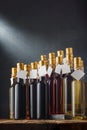 Wines assortment. Many 250 ml bottles of red, pink, white dry dessert wines with blank labels, mockup template. Vertical shot.