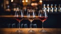 Wines assortment. Red, white, rose wine in wineglasses and bottles on gray background. Wine bar, shop, tasting concept Royalty Free Stock Photo