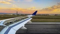 Wing of an aircraft with flaps extended and aerodynamic brakes braking the aircraft after landing at Paris-Charles de Gaulle Royalty Free Stock Photo