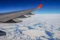 The wing of the aircraft over the Arctic ocean Royalty Free Stock Photo