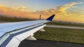 Wing of an aircraft retracting the aircraft flaps after landing at Paris-Charles de Gaulle Airport for landing