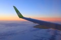 The wing of an airliner in flight over Siberia Royalty Free Stock Photo