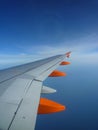 Wing on the blue endless sky Royalty Free Stock Photo