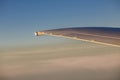A wing in the clouds Royalty Free Stock Photo