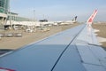 wing on commercial plane take off from Fukuoka airport