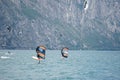 Wing-foil surfer with other surfers on the Lake Garda, Italy. Royalty Free Stock Photo