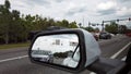 Wing Mirror Of A Car Moving In The Street