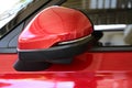 wing mirror of red car, transportation industry