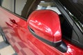 wing mirror of red car, transportation industry