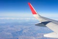 Wing of the plane on blue sky background Royalty Free Stock Photo