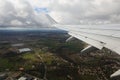 The wing of a RyanAir aircraft taking off overlooking the vicinity of the Airbus plant in Toulouse Blagnac Royalty Free Stock Photo