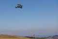 Wing walking on a clear day over airfield