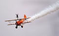 Wing walking display with Boeing Stearman biplanes.