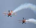 Wing walking display with Boeing Stearman biplanes. Royalty Free Stock Photo