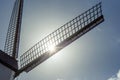 Wing of windmill in sun backlight Royalty Free Stock Photo