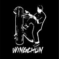 wingchun fighter train with wooden dummy