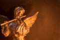 Winged Angel Playing Flute Royalty Free Stock Photo