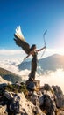 Winged Archer Statue on Mountain Peak Above Clouds, Majestic Sky Royalty Free Stock Photo