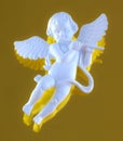 Winged cherub playing flute Royalty Free Stock Photo