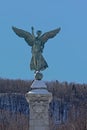 Statue winged Goddess of Liberty in front of Mont Royal, Montreal