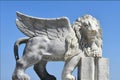 Winged lion against blue sky Royalty Free Stock Photo