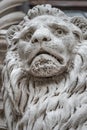 Winged lion with a Bible and a priest at Basilica San Marco in Venice, Italy, summer time, details, closeup Royalty Free Stock Photo