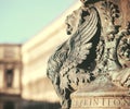 Winged lion statue architectural fragment from Venice. Detail of winged lion in flag mast on Piazza San Marco, Venice, Italy Royalty Free Stock Photo