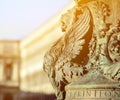 Winged lion statue architectural fragment from Venice. Detail of winged lion in flag mast on Piazza San Marco, Venice, Italy Royalty Free Stock Photo