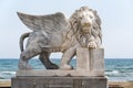 Winged Lion of Venice statue at Foinikoudes promenade. Smiling lion monument, Larnaca. Cyprus Royalty Free Stock Photo