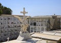 Winged statue in a small cemetary behind the Church of San Giorgio atop a hill in Portofino, Italy.