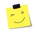 Wink face on adhesive note