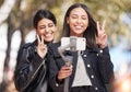 Wink, selfie and peace sign with friends in city for social media, happy and support. Happiness, profile picture and Royalty Free Stock Photo