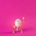Winking Easter egg toy in the shape of a light bulb Royalty Free Stock Photo