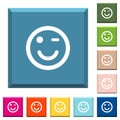 Winking emoticon white icons on edged square buttons