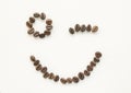 Winking smiling face of coffe beans Royalty Free Stock Photo