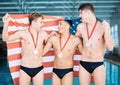 Winner, gold medal and the usa water polo team in celebration of success at a sports event in a gym. Fitness, victory Royalty Free Stock Photo