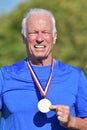 Winner Male Senior Athlete With Medal Royalty Free Stock Photo