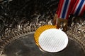 Winner medal with fabric neck holder ribbon. Royalty Free Stock Photo