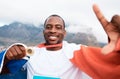 Winner portrait, flag or black man with gold medal, emoji sign and pose for marathon runner, competition or champion