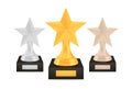 Winner star awards set, gold silver bronze trophy cups on stands with empty plates Royalty Free Stock Photo