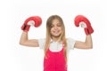 Winner takes it all Child ambitious likes win and success. Girl on smiling face posing with boxing gloves as winner