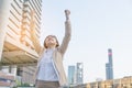 Winner woman celebrating success on city background Royalty Free Stock Photo