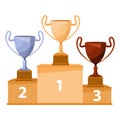 Winners podium with goblet. Gold, silver and bronze trophy cups. Royalty Free Stock Photo