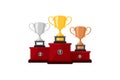 Winners podium with trophies. Trophy prizes for the Champions. Three vector champion cups: gold, silver, and bronze trophy Royalty Free Stock Photo